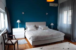 Ένα ή περισσότερα κρεβάτια σε δωμάτιο στο Sweet home in Aigio