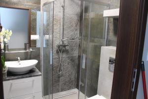Kúpeľňa v ubytovaní Apartamenty Jagiellońska 23 + 25 fotografií