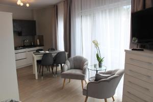 Kuchyňa alebo kuchynka v ubytovaní Apartamenty Jagiellońska 23