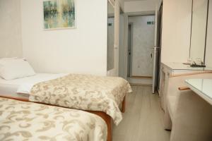 Una cama o camas en una habitación de Hotel Sunce