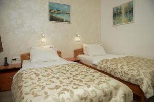 Una cama o camas en una habitación de Hotel Sunce