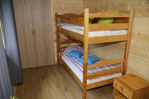 Postel nebo postele na pokoji v ubytování CampCity Frombork