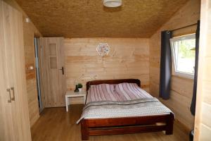 Postel nebo postele na pokoji v ubytování CampCity Frombork