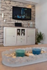 Kuchyň nebo kuchyňský kout v ubytování Apartmani Rudius