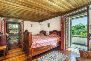 Postel nebo postele na pokoji v ubytování Quinta de Santa Júlia + 36 fotografií