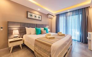 Postel nebo postele na pokoji v ubytování Seastar Hotel