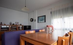 A television and/or entertainment centre at Cantos do Coido