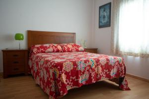 A bed or beds in a room at Cantos do Coido