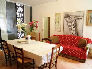 A seating area at Apartment in Modigliana with Pool & Forest Views