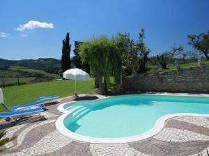 The swimming pool at or close to Apartment in Modigliana with Pool & Forest Views