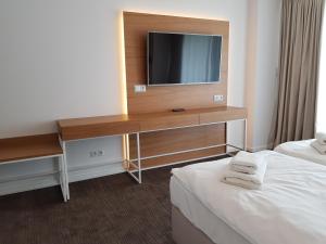 Łóżko lub łóżka w pokoju w obiekcie Seaside Park Resort