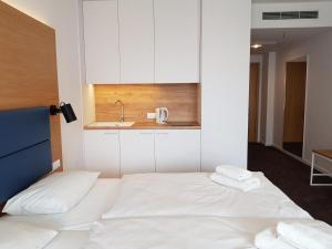 Łóżko lub łóżka w pokoju w obiekcie Seaside Park Resort