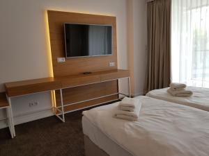 Łóżko lub łóżka w pokoju w obiekcie Seaside Park Resort