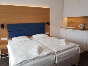Łóżko lub łóżka w pokoju w obiekcie Seaside Park Resort