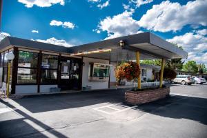 a gas station in a parking lot at American Classic Inn in Salida