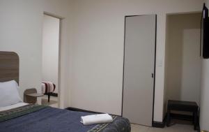 Postel nebo postele na pokoji v ubytování Hotel Winn Comfort