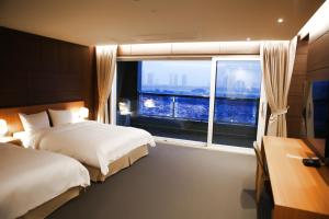 Postel nebo postele na pokoji v ubytování Incheon Stay Hotel + 37 fotografií