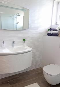 Łazienka w obiekcie Apartments Medulin - Orijeta