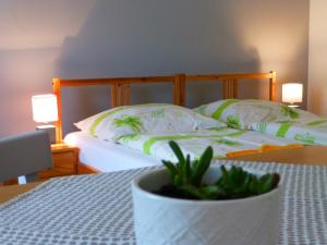 Ein Bett oder Betten in einem Zimmer der Unterkunft Ubytovanie na Frantšachte