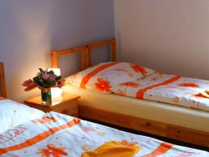 Ein Bett oder Betten in einem Zimmer der Unterkunft Ubytovanie na Frantšachte