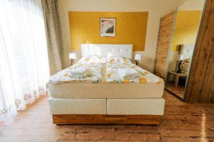 Letto o letti in una camera di Stockers kleines Dorfhotel