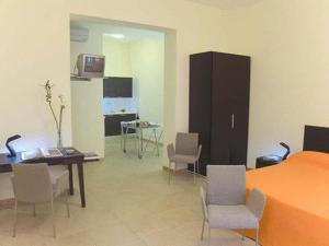 TV a/nebo společenská místnost v ubytování Palazzo Serraino