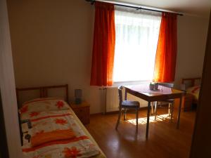 Ein Bett oder Betten in einem Zimmer der Unterkunft Ubytovanie na Frantšachte
