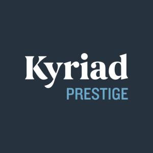 Una señal con las palabras Kyrld Prestige escritas en Kyriad Prestige Hotel Clermont-Ferrand en Clermont-Ferrand