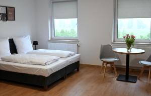 Posteľ alebo postele v izbe v ubytovaní ZatorHome apartamenty - blisko Energylandii i Zatorlandu