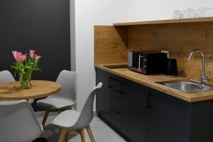 Kuchyňa alebo kuchynka v ubytovaní ZatorHome apartamenty - blisko Energylandii i Zatorlandu