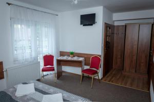 Telewizja i/lub zestaw kina domowego w obiekcie Willa JanDor