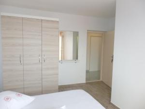 Posteľ alebo postele v izbe v ubytovaní Apartmani Stipan