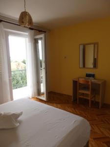 Posteľ alebo postele v izbe v ubytovaní Apartmani Stipan