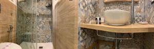 Un baño con ducha, lavabo e inodoro. en Little Dream Residenza - Napoli, en Nápoles