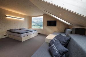 TV a/nebo společenská místnost v ubytování Revier Mountain Lodge Adelboden
