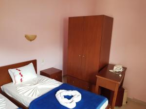 Postel nebo postele na pokoji v ubytování Smaro Studios