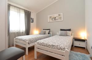 Postel nebo postele na pokoji v ubytování House Medulin 1744