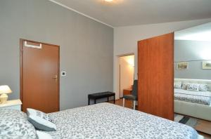 Postel nebo postele na pokoji v ubytování House Medulin 1744