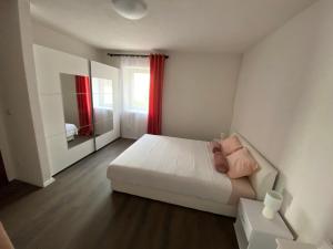 Postel nebo postele na pokoji v ubytování Villa Magia sul Mare