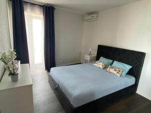 Postel nebo postele na pokoji v ubytování Villa Magia sul Mare