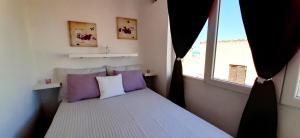 Postel nebo postele na pokoji v ubytování Pipo Apartment Mareda
