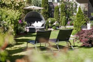Vonkajšia záhrada v ubytovaní Garni Hotel Platzer