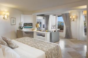 Кровать или кровати в номере Hotel Abi d'Oru