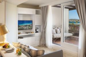 Телевизор и/или развлекательный центр в Hotel Abi d'Oru