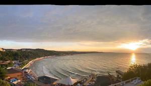 a view of the beach at sunset at Erzurumlu Hotel in Kilyos