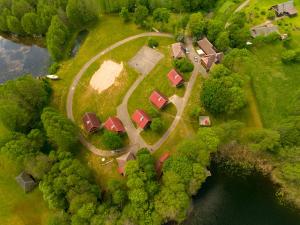 an aerial view of a farm with houses and a road at AB Imeda poilsiavietė in Ignalina