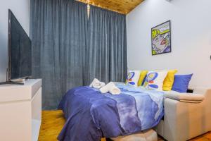 Posteľ alebo postele v izbe v ubytovaní Apartamento de diseño centro Sevilla. WiFi/AC