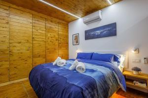 Posteľ alebo postele v izbe v ubytovaní Apartamento de diseño centro Sevilla. WiFi/AC