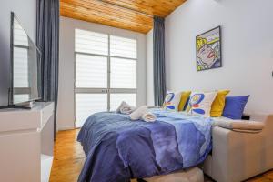 Posteľ alebo postele v izbe v ubytovaní Apartamento de diseño centro Sevilla. WiFi/AC