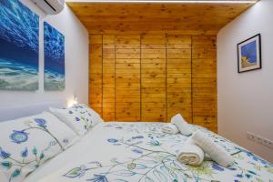 Posteľ alebo postele v izbe v ubytovaní Apartamento de diseño centro Sevilla. WiFi/AC